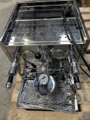 A pre-owned ECM Synchronika Espresso Machine with some damage (sold as seen, suitable for parts).