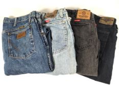 A quantity of pre-owned Wrangler jeans and related, various sizes and colours.