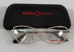 A pair of Etnia Barcelona Koenji Eyeglasses, demo lenses with case.