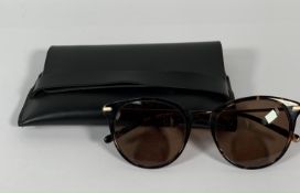 A pair of Ace & Tate Sugar Man Tortoiseshell frame, brown tint lenses, gold coloured arms with case.