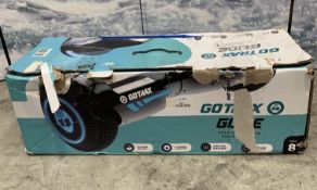 A Go Trax Glide self-balancing board boxed.