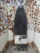 An as new Brabantia Fairtrade ironing board in grey (124 x 38).