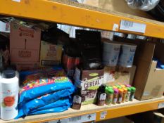 A quantity of assorted food/confectionery/sauces/herbs/fizzy drinks and related (one shelf).