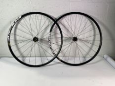 A pair of Mavic Aksium wheels (622x17c) (some marks on both wheels).