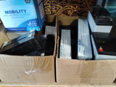 A quantity of assorted batteries and related to include Yuasa and Genesis.