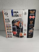 A Ninja Slushi frozen drinks maker, model: FS310UK 240v (outer box distressed).