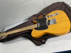 A pre-owned Fender Standard Telecaster, maple fingerboard, black pickguard, butterscotch blonde with