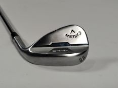 A pre-owned Callaway Opus Gap Wedge 50°, Gold Dynamic Mid Shaft, Chrome, Right Handed.