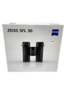 As new Zeiss SFL 8x30 Binoculars (EAN: 4047865000529) (Damage to box).