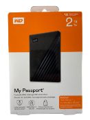 Six as new Western Digital My Passport 2TB Portable Hard Drives (EAN: 718037869476).