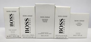 Five nearly new Hugo Boss perfumes/testers and related, boxed (please note: bottles may have been ve