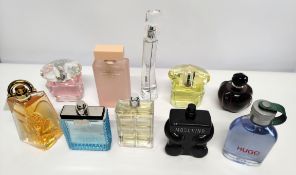 Thirty nearly new perfumes/testers and related to include Michael Kors, Boss, Versace, Burberry and