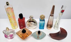 Thirty nearly new perfumes/testers and related to include DKNY, Versace, Lancome, Kenzo and more (pl