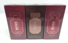 Three as new Boss 30ml The Scent parfum's - two Magnetic and one le parfum, sealed boxes.