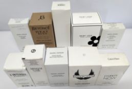 Thirty nearly new perfumes/testers and related to include Beyonce, Marc Jacobs, CK, Lacoste, Hugo Bo