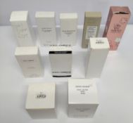 Thirty nearly new perfumes/testers and related to include Dolce & Gabbana, Mark Jacobs, Elizabeth Ta