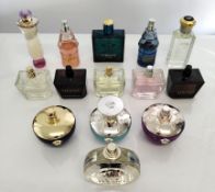 Twenty eight Versace perfumes/testers and related (please note: bottles may have been used/packaging