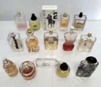 Forty perfumes/testers and related to include Ralph Lauren, Jimmy Choo, Boss and Givenchy (please no