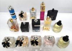 Thirty YSL perfumes/testers and related (please note: bottles may have been used/packaging may have