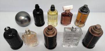 Twenty five Boss perfumes/testers and related (please note: bottles may have been used/packaging may