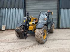 2014 CAT TH407C materials handler with Caterpillar headstock and pallet tines on Michelin 500/70R24