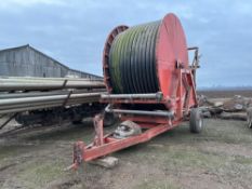 Bauer single axle irrigation reel with rear carriage and rain gun