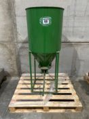 Grain bin with chute
