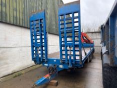 2011 Stewart GX15 FTZ 15t 27ft flat bed tri-axle trailer with hydraulic operated front ramps, strap