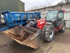 2010 Manitou MLT735 120LSU materials handler with pallet tines and general purpose bucket. Reg: HF10