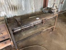 Metal work bench with vice and bench grinder. Sold in situ buyer to disconnect and remove