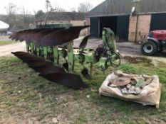 Dowdeswell DP7 6 furrow reversible plough. Serial No: 314341792. C/w pallet of spares