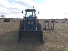 Ford 6810 4wd tractor c/w Quicke front loader and bucket and home made bale spike. On 13.6R24 front