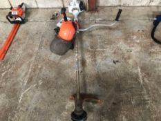 Stihl FS56C petrol strimmer with spare strim head, face shield and cord. Manual available in office.