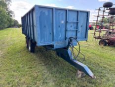 Farm made 12t twin axle grain trailer with manual tailgate and grain chute, twin ram