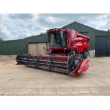 2011 Case Axial Flow 5088 combine harvester on Goodyear 800/65R32 front and 480/70R30 rear wheels an