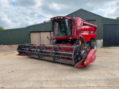 2011 Case Axial Flow 5088 combine harvester on Goodyear 800/65R32 front and 480/70R30 rear wheels an
