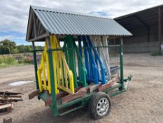 Quantity horse jump wings on single axle transport trailer