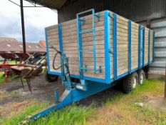 1975 twin axle, twin ram tipping trailer with timber floor and timber drop sides, manual rear door,