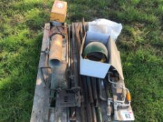 Assorted metal bars, manual drills, welding mask