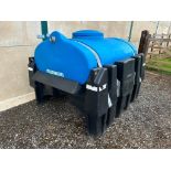 Western Trailers 1000l plastic tank. C/w skid unit and forklift tine pockets