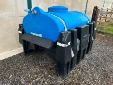 Western Trailers 1000l plastic tank. C/w skid unit and forklift tine pockets