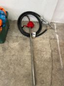 Manual barrel pump and fuel hose with nozzle