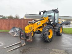 2018 JCB TM320S T4FIV pivot steer materials handler with pin and cone headstock and pallet tines and