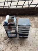 2No plastic drawers with dairy spares and calf feeder