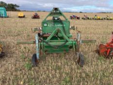 Mini-tunnel hoop machine with fleece laying implement