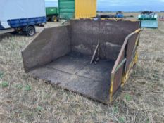Converted crate stacker used for manure storage on JCB Q-fit brackets