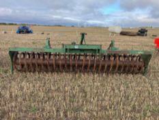 Cousins 4m front mounted press with leading tines
