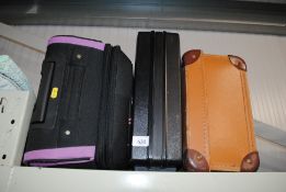 Three travel cases