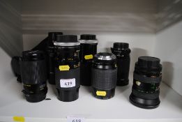 A quantity of various camera lenses to include Mir