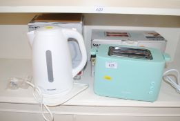 A Silver Crest toaster and kettle